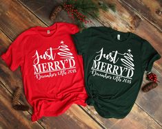 two t - shirts with the words just merry and december written on them