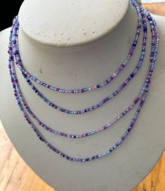 Purple dreams and purple rain mix necklace and wrap bracelet. Beautiful color mix of purples and blues and soft pinks with sparkling clear 2mm seed beads. The 72" necklace can wrap 2-3 times on neck or the bracelet wraps 8-10 on wrist. Color mixes with almost any outfit through every season.  Buy for friend or yourself and be prepared for compliments. Purple Beaded Jewelry For Festivals, Bohemian Purple Beaded Necklaces With Faceted Beads, Purple Faceted Beads Jewelry For Festival, Bohemian Purple Beaded Necklace With Faceted Beads, Festival Purple Faceted Beads Jewelry, Purple And Blue Necklace, Bohemian Purple Faceted Bead Necklace, Purple Multi-strand Beads For Jewelry Making, Elegant Purple Jewelry With Multi-colored Beads