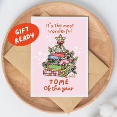 a greeting card with an image of a christmas tree on it and the words, it's the most wonderful time of the year