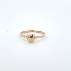 14k solid gold baby ring, ring size 4 stamped 14k gold.  Keepsake gift or midi, or pinky ring.  Model is 9 and wearing on her middle finger.  Puff heart design ring Celebrate with and wear to or gift for the following occasions or styles   :Baptisim :Christmas :Dedication :Birthday :Bridal Party :Midi :First knuckle :Above knuckle  :Daughters first ring Valentine's Day Yellow Gold Stackable Rings, Gold 14k Heart-shaped Stackable Rings, Gold Heart-shaped Stackable Rings, Stackable 14k Gold Rings For Valentine's Day, 14k Gold Heart Shaped Stackable Rings, Stackable Yellow Gold Heart Ring As Gift, Yellow Gold Stackable Heart Ring, Stackable Yellow Gold Heart Ring, 14k Yellow Gold Heart Cut Stackable Rings