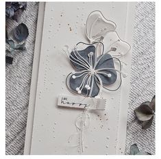 a close up of a card with flowers on it