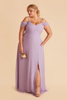 a woman in a long purple dress