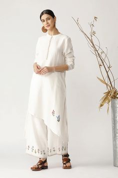 Ecru Tunic With Pant Spring Linen Tunic With Embroidery, Off White Floral Embroidered Kurta For Spring, Elegant White Tunic With Floral Embroidery, Spring Kurta With Embroidered Hem And Long Sleeves, Embroidered Hem Tunic Kurta, Spring Long Sleeve Kurta With Embroidered Hem, White Straight Kurta Tunic For Spring, White Asymmetrical Hem Tunic For Spring, Payal Pratap