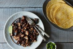 the meal is prepared and ready to be eaten on the table with tortillas