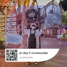 a person standing in front of a sign with an image of a boy wearing overalls