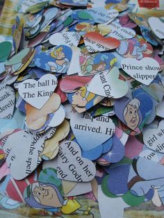 a pile of paper heart shaped confetti made to look like children's books