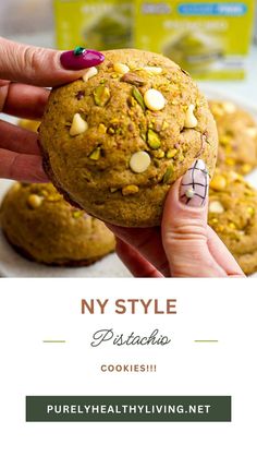 a person holding a cookie in their hand with the caption ny style pistachio cookies