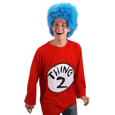 a young man wearing a thing 2 t - shirt with blue hair on his head