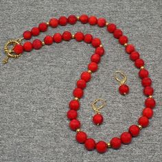 Beaded Gemstone Necklace Description: •Natural Gemstone Beads: Red Coral (10mm round)•Approximate Length: 21"  •Clasp:  Gold Toggle       •Coordinating Earrings Included •Free Domestic Shipping – Arrives in Gift Box – Gift Wrapping AvailableThe beaded necklace is handmade custom designed using precious natural gemstones artistically designed into the unique one of a kind statement necklace. This is the exact necklace you will receive when purchased.Each necklace is handmade by me from inception Luxury Red Coral Gemstone Necklace, Luxury Red Coral Beaded Necklaces With Gemstone Beads, Luxury Red Coral Round Beaded Necklaces, Luxury Necklace With Round Red Coral Beads, Red Coral Jewelry With 8mm Beads, Red Polished Beads Round Jewelry, Red Coral Round Beads For Jewelry Making, Red Coral Jewelry With Natural Stones In Round Beads, Adjustable Red Coral Jewelry