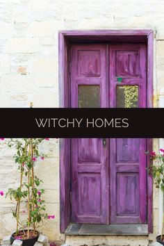 a purple door with the words witch homes on it in front of some potted plants