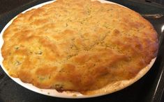 a baked dish sitting on top of a stove