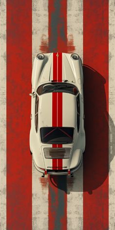 an overhead view of a white sports car with red stripes