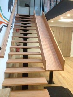 the stairs are made of wood and metal