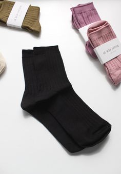 Soft and silky knit socks that hit at just the right height. Pair with heels, sandals, or tennis shoes to add a cool pop of color. Made in Korea Size: o/s Trendy Black Sports Socks, Cute Black Cotton Socks, Black Cotton Sporty Socks, Cotton Socks Brown, Playful Black Cotton Socks, Cool Pops, Heels Sandals, Knit Socks, Tennis Shoes