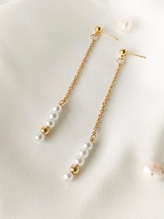 Julia Pearls Drop Earrings - Salty Threads Gold Beaded Chain Earrings For Wedding, Minimalist Pearl Chain Earrings For Party, Formal Gold Linear Earrings With Pearl Chain, Gold Linear Pearl Chain Earrings For Formal Occasions, Classic Gold Linear Earrings With Pearl Chain, Gold Linear Pearl Chain Earrings As Gift, Gold Linear Earrings With Pearl Chain, Minimalist Pearl Earrings With Adjustable Chain, Gold Pearl Earrings With Delicate Chain