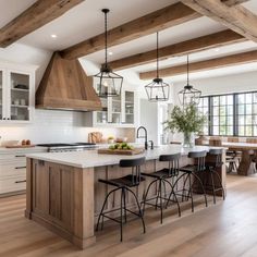 a large kitchen with an island and lots of counter space