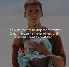 a man holding a baby in his arms with a quote about the meaning behind it