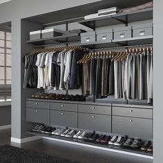 a walk in closet filled with lots of clothes