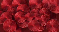 many red and gold fan shaped objects are arranged in the shape of an abstract pattern