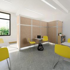 a room with yellow chairs and a white table