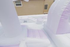 an inflatable bed with pillows on top of it