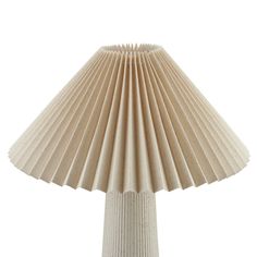 a white table lamp that is made out of paper