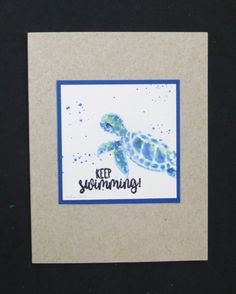 a card with an image of a turtle and the words keep swimming written on it