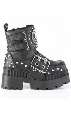 Stay Spooky™ with the WRATH-58 Platform Boots! These babies make a statement with the studs covering the front of the shoe and decked out with a spider and chains. 3 1/4" Inch (83mm) Chunky Heel 2" Inch (51mm) Square-Toe Platform Ankle Boot Featuring Ornamental Double Grommet Buckle Strap, 'Demonia’ Patch Branded Shield w/ Dual Hook-N-Loop Straps and Cone Studded Upper Details Inside Metal Zip Closure 100% Vegan. US women's sizing: refer to size chart for more info. Leather Platform Boots, Demonia Shoes, Black Vegan, Baby Makes, Platform Ankle Boots, Platform Boots, Chunky Heel, Chunky Heels, Vegan Leather