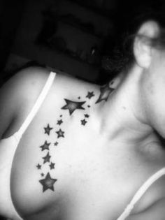 a woman's chest with stars on it