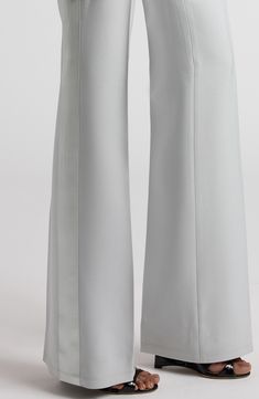 Featured on the label's fall '24 runway show, these wide-leg pants detailed with angled front pockets and tuxedo-style outseam stripes are crafted in a luminous blend wool and silk. 38" inseam; 22" leg opening; 12" front rise; 14" back rise (size 36it) Zip fly with hook-and-bar closure Front slant pockets; back button-welt pockets Cupro/silk lining 90% wool, 10% silk with 100% silk contrast Dry clean Made in Italy Designer Clothing Tuxedo Pants, Tuxedo Style, Fall 24, Pants Details, Runway Show, Welt Pockets, Welt Pocket, Tom Ford, Leg Pants