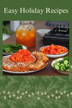 an easy holiday recipe book is on the table with food and drinks in front of it