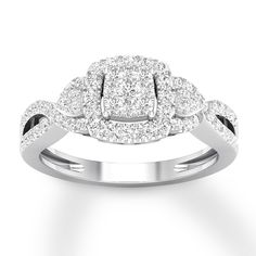 a white gold ring with diamonds on it