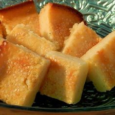 pieces of cake sitting on top of a glass plate