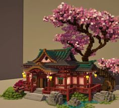 a small building with pink flowers on it