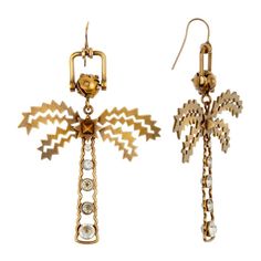 Dangling Antique Gold Finish Earrings Adorned With Crystals Gorgeous Unique Earrings With Valentino’s Signature Detailing Dangling Palmtrees Roller Ball At Top With French Hook Back Unique Edgy Palm Fronds With Center Signature Rock Stud Trunk Embellished With Crystals Antique Gold Tone Finish Materials: Metals, Crystals Imported Tags, Jewelry Bag Really Great Looking Valentino Jewelry, Palm Fronds, Roller Ball, Jewelry Bag, Jewelry Bags, Unique Earrings, Palm Tree, Gold Finish, Antique Gold