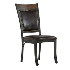 a black chair with brown leather upholstered back and nailing on the seat