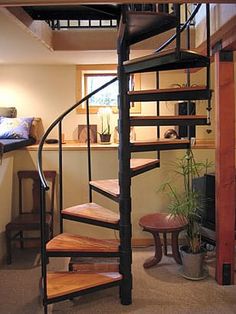 there is a spiral staircase in the living room