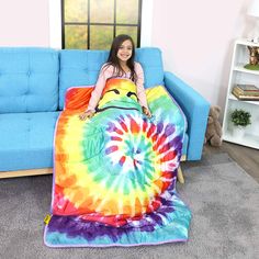 "Buy the Good Banana™ Tie Dye Weighted Blanket at Michaels. com. Only from Good Banana, this weighted blanket brings a big, calming smile to any room in the house—literally! Only from Good Banana, this weighted blanket brings a big, calming smile to any room in the house—literally! While most sensory blankets are a drab gray or blue color, this fun design brings all of the benefits of mom or dad's favorite weighted blanket to a kid-friendly size and aesthetic. The 5 lb. weight is soothing for ch Weighted Blanket For Kids, Sensory Blanket, Kids Tie Dye, Dads Favorite, Vibrant Style, Muslin Swaddling, Soft Corals, Tie Dye Designs, Weighted Blanket