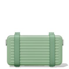 Made in Germany and crafted in ultra-lightweight, dent-resistant grooved polycarbonate, the RIMOWA Personal Cross-Body Bag in Bamboo green is a unisex hard-shell crossbody bag meant to house and transport your daily personal essentials. It can be worn with the detachable, adjustable leather body strap or carried like a clutch. Each detail of the RIMOWA Personal Polycarbonate Cross-Body Bag is carefully considered, from its color-matched straps and leather lining down to its metal rivets, rings, Functional Green Nylon Luggage, Modern Green Luggage With Sleeve, Rimowa Hand Carry Luggage, Rimowa Luggage Green, Luxury Green Nylon Bag, White Bag, Crossbody Bag, Shop Now, Leather