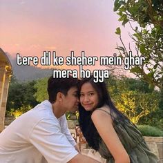 a man and woman sitting next to each other with the caption, tere dil ke sheher mein ghar mera ho gay