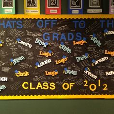 a bulletin board with words and pictures on it that says, hats off to the grads class of 2012