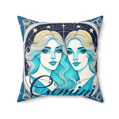 two women with blue hair and stars on their faces are featured in this decorative pillow