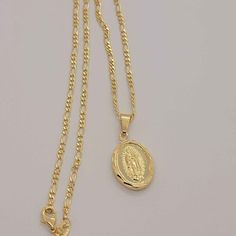 Brazilian 18k Gold Filled Virgen De Guadalupe Necklace Length Is 20" Brand New Free Jewelry Bag Included Nwt Does Not Tarnish It Can Last For Years With Proper Care Shipping From Ny Free Shipping - After 2 Items Automatic 10% Off After 4 Items With Free Shipping Send Me A Message To Do The Bundle Deal Catholic Dimond Cross Woman Necklace, Yellow Gold Oval Necklace With Our Lady Of Guadalupe, Gold Our Lady Of Guadalupe Necklace In 14k Gold, 14k Gold Necklace With Our Lady Of Guadalupe, 14k Gold Our Lady Of Guadalupe Necklace, Infinity Symbol Necklace, Guadalupe Necklace, Cat Eye Necklace, Clear Necklace