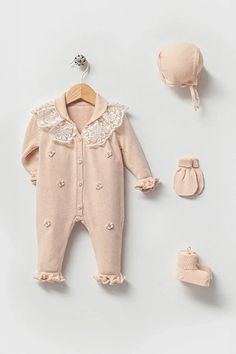 Dress your newborn in the epitome of grace and comfort with the Lily Beige Newborn Knitwear Set. This exquisite collection is designed with the softest cotton knit to ensure your little girl's utmost comfort in any season. Celebrate your newborn's first journey home with our premium Lily Beige Newborn Knitwear Set. This ensemble is lovingly crafted to provide your baby girl with the warmth and comfort she deserves during this special time. Made from breathable, soft cotton knit, this set is gent Newborn Homecoming Outfit, Newborn Knitwear, Knit Onesie, Yellow Party Dresses, Homecoming Outfit, Pink Newborn, Dress Layered, Pink Party Dresses, White Dress Party