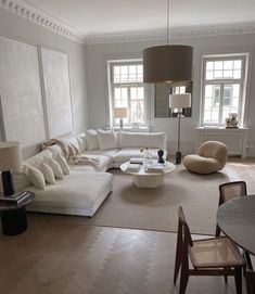 a living room filled with lots of furniture