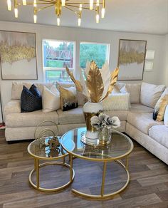 a living room with two couches and a coffee table in front of a window