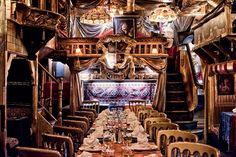 an elaborately decorated dining room in a restaurant