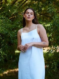 "ADALINE is a square neck strap midi linen dress. DETAILS - Square neckline - Spaghetti straps - Midi length - 100% midweight European linen fabric - Cut and sewn to order just for you in our studio COLOR - White, you can also choose other colors above - Fabric samples are available here https://www.etsy.com/listing/586569696/linen-fabric-samples SIZING & FIT - Fits true to size with relaxed fit touch - Model is 5'6\" / 172 cm and wearing a size M CARE FOR LINEN - Machine wash up to 30ºC/86ºF gentle cycle - Lay flat to dry or tumble dry low - Warm iron if needed - Do not bleach SIZE GUIDE Size conversion guide Size XS (US 0-2, IT 36-38, UK 4-6, Japan 3-5, France 32-34) Size S (US 4-6, IT 40-42, UK 8-10, Japan 7-9, France 36-38) Size M (US 8-10, IT 44-46, UK 12-14, Japan 11-13, France 40-42 Spring Midi Dress With Delicate Straps And Straight Neckline, Square Neck Sundress With Straps For Brunch, Summer Midi Slip Dress With Straps, Summer Linen Dress With Square Neck, Spring Vacation Linen Dress With Square Neck, Square Neck Linen Dress For Daywear, Summer Midi Dress With Delicate Straps And Straight Neckline, Summer Dress With Delicate Straps And Square Neck, Square Neck Midi Dress With Adjustable Straps For Daywear