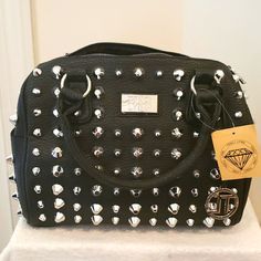 New Black With Silver Stud Design All Over. The Hand Bag Has Two Side Pockets , One Zipper Pocket On The Inside And Open Pockets On The Inside. Handbag Has A Working Zipper Closure And Comes With A Adjustable Strap. Black Studded Purse, Alternative Beauty, Fancy Handbags, Stud Design, Studded Purse, Wearing All Black, Fringe Bags, Phone Holster, Rain And Snow Boots