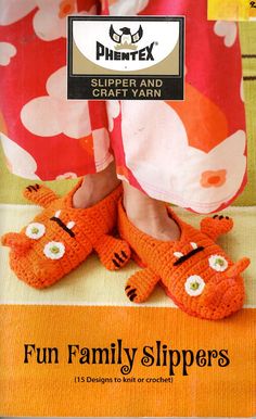 an advertisement for slippers and craft yarns featuring a woman's feet in orange cat slippers